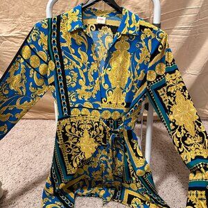 Blue/Yellow/Black mini dress with long sleeves wraps with a tie in middle front